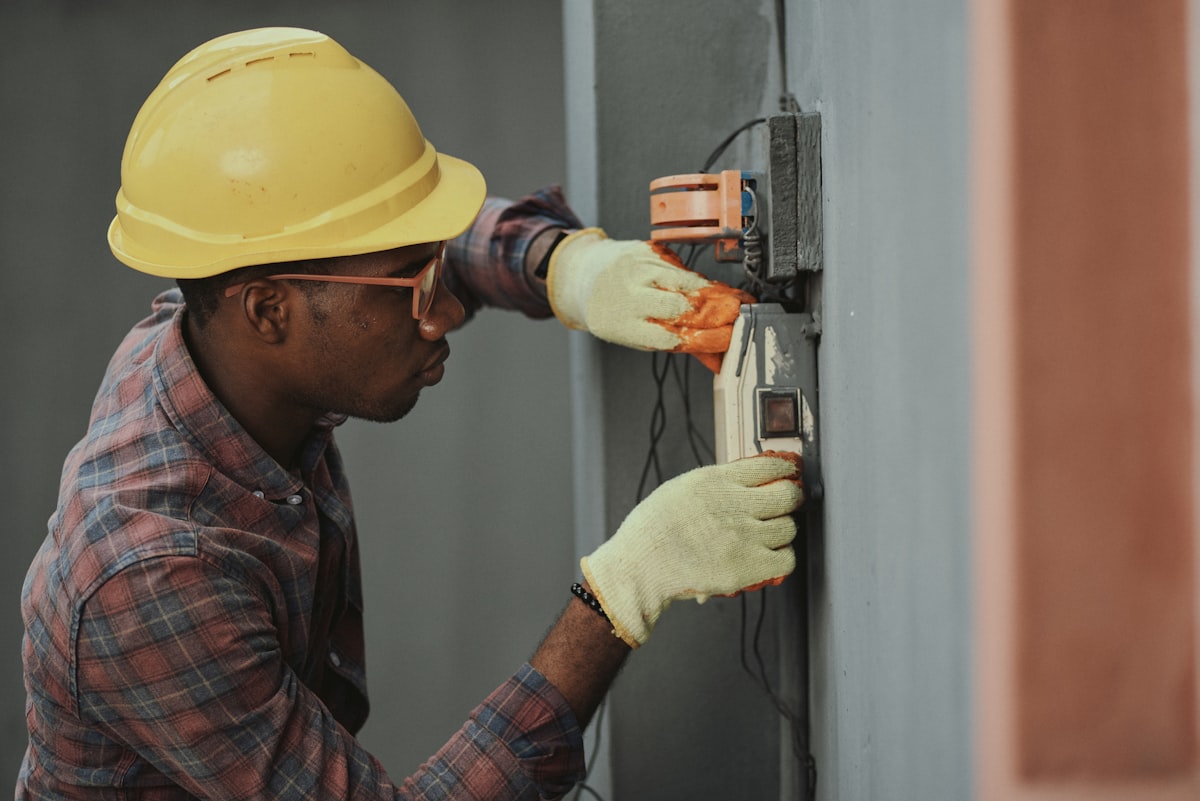 HVAC technician working on a residential air conditioning unit